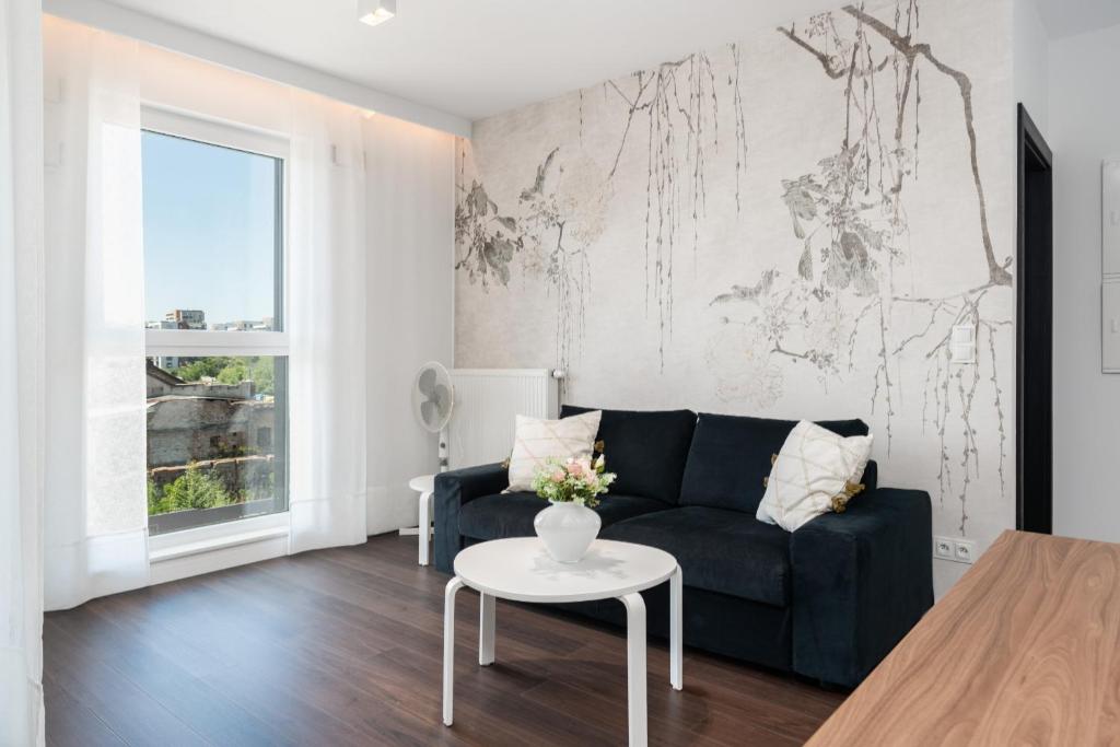 Posedenie v ubytovaní Stylish & Comfy Garbary Apartments with Parking by Noclegi Renters