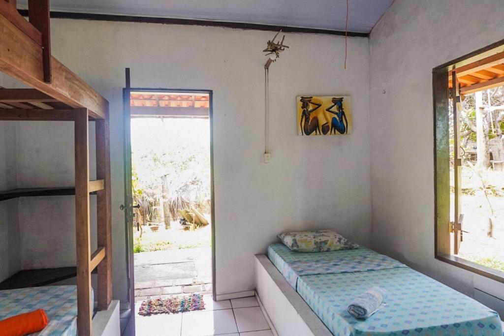 Uma cama ou camas num quarto em Pousada Mirage Atins