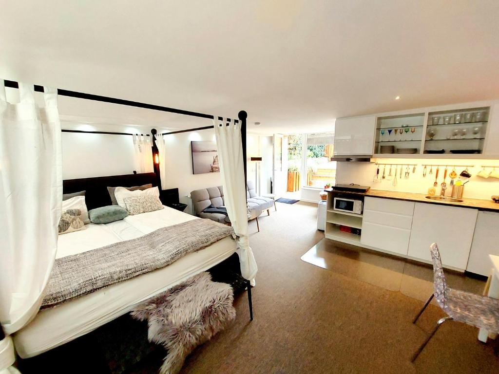 Neptun Studio-apartment with terrace.にあるベッド