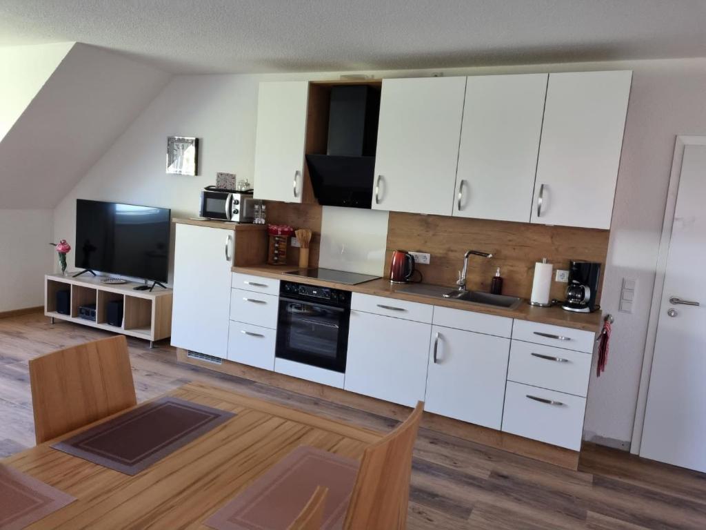 Kuchyň nebo kuchyňský kout v ubytování Landhaus Westerloy