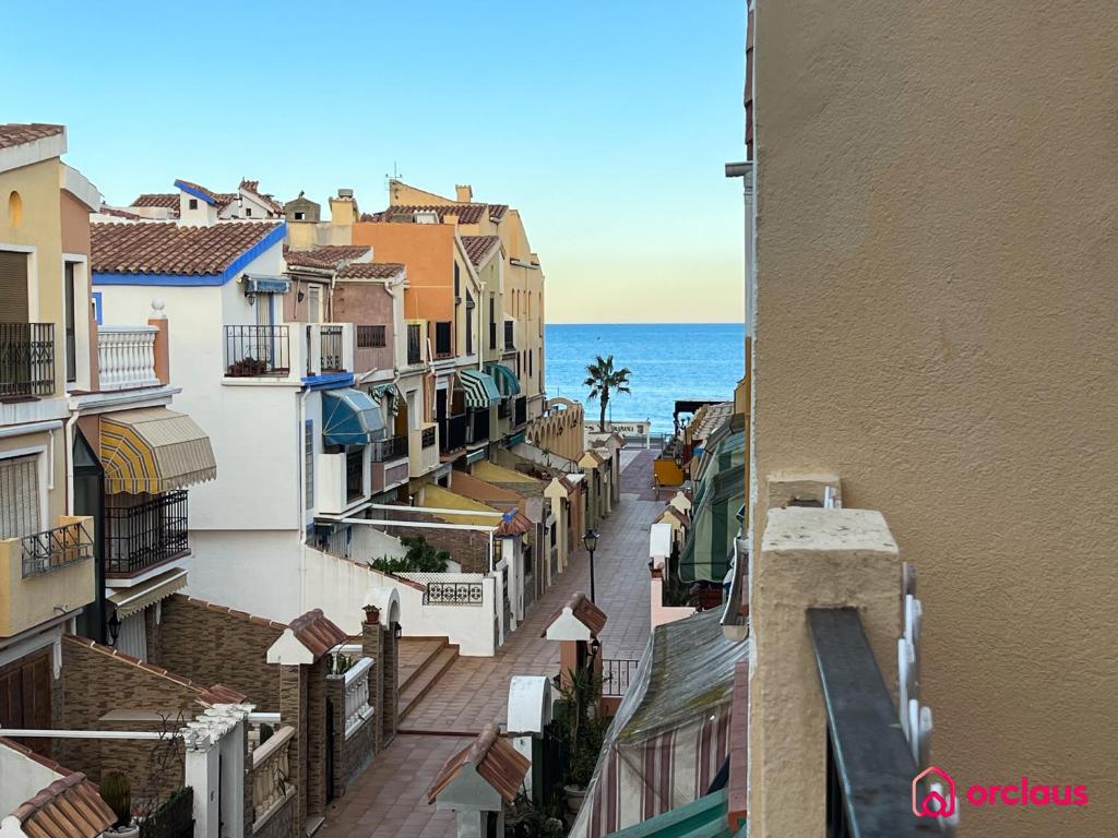 an aerial view of a city with the ocean at La Casona in Oropesa del Mar