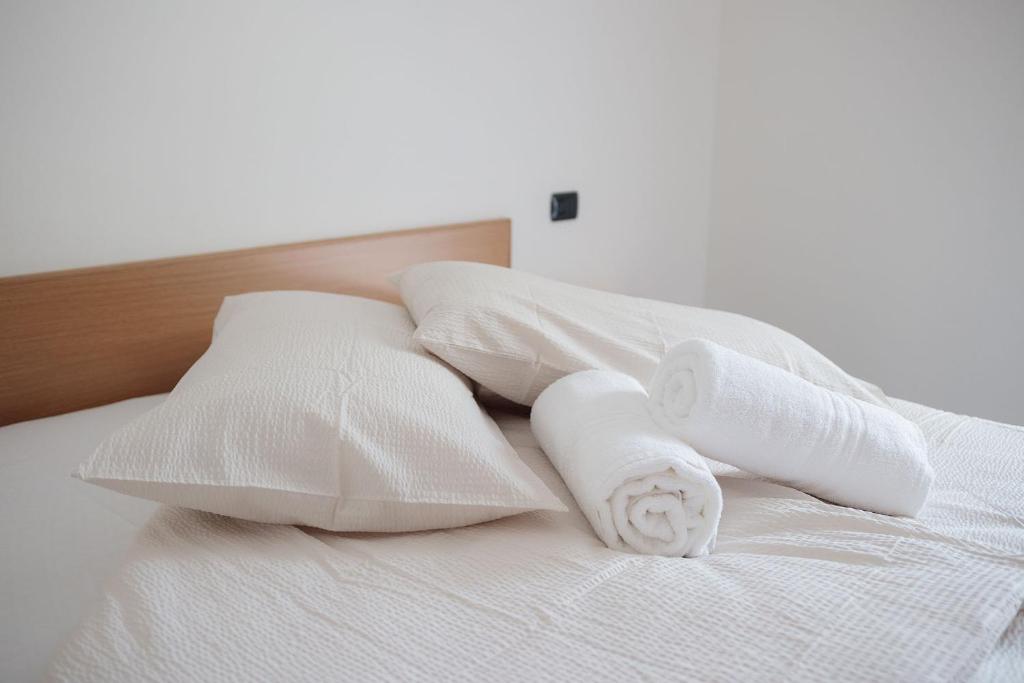 Postel nebo postele na pokoji v ubytování Hotel Milano