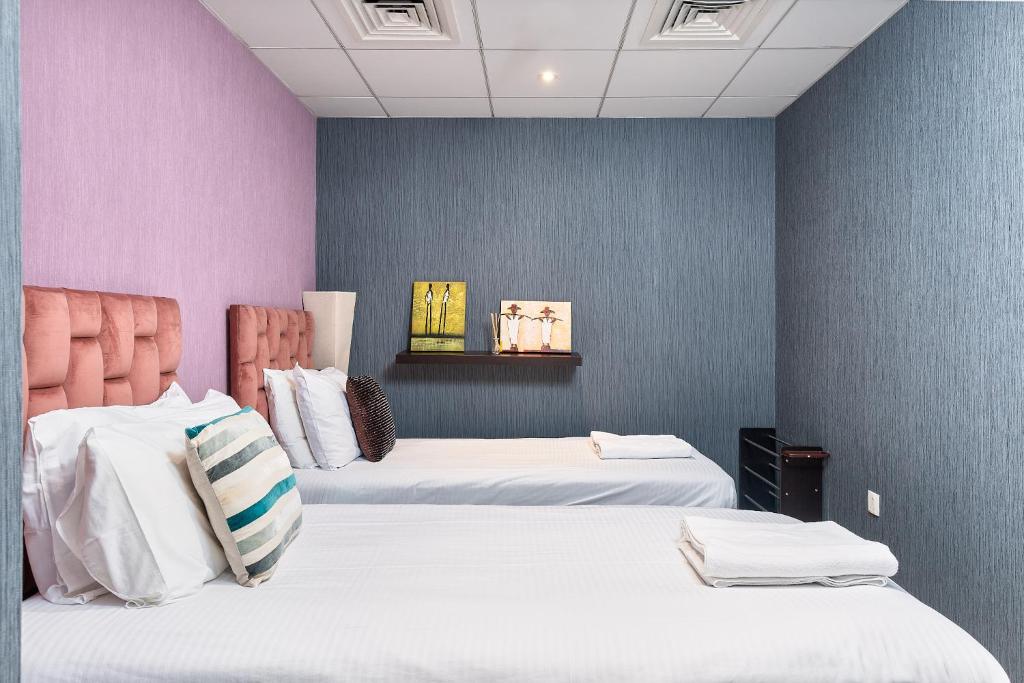 Postel nebo postele na pokoji v ubytování Bellavista - 1 BR - with Extra Room - Partial Fountain View