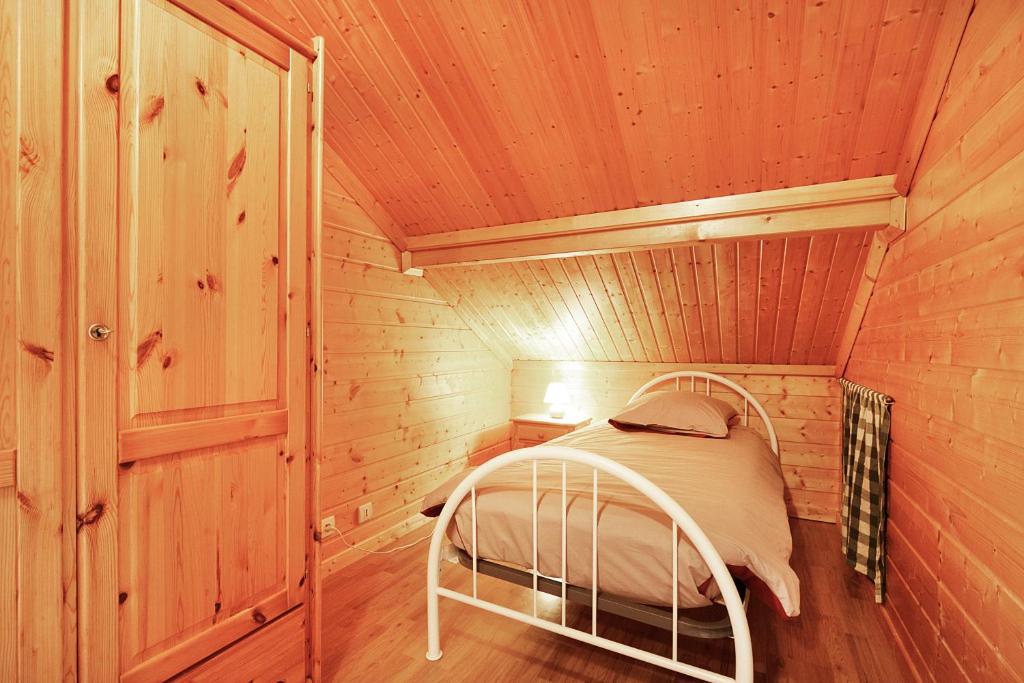 Postel nebo postele na pokoji v ubytování Le Chalet des Cœurs - Avec vue montagne