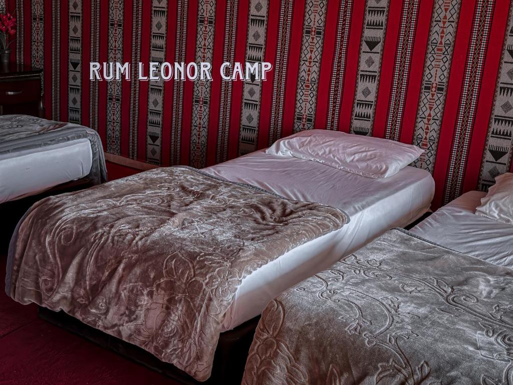 Postel nebo postele na pokoji v ubytování RUM LEONOR CAMP