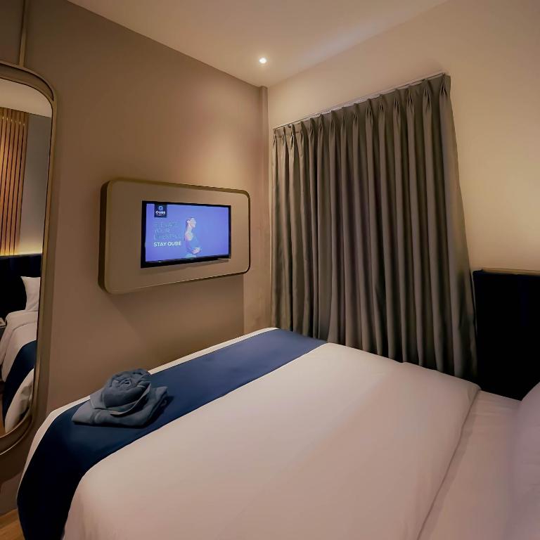 Postel nebo postele na pokoji v ubytování Qube Hotel by 98hospitality
