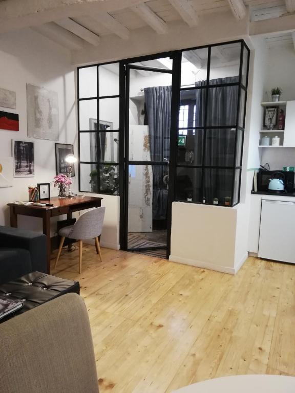 A kitchen or kitchenette at Apartments Campo de Fiori