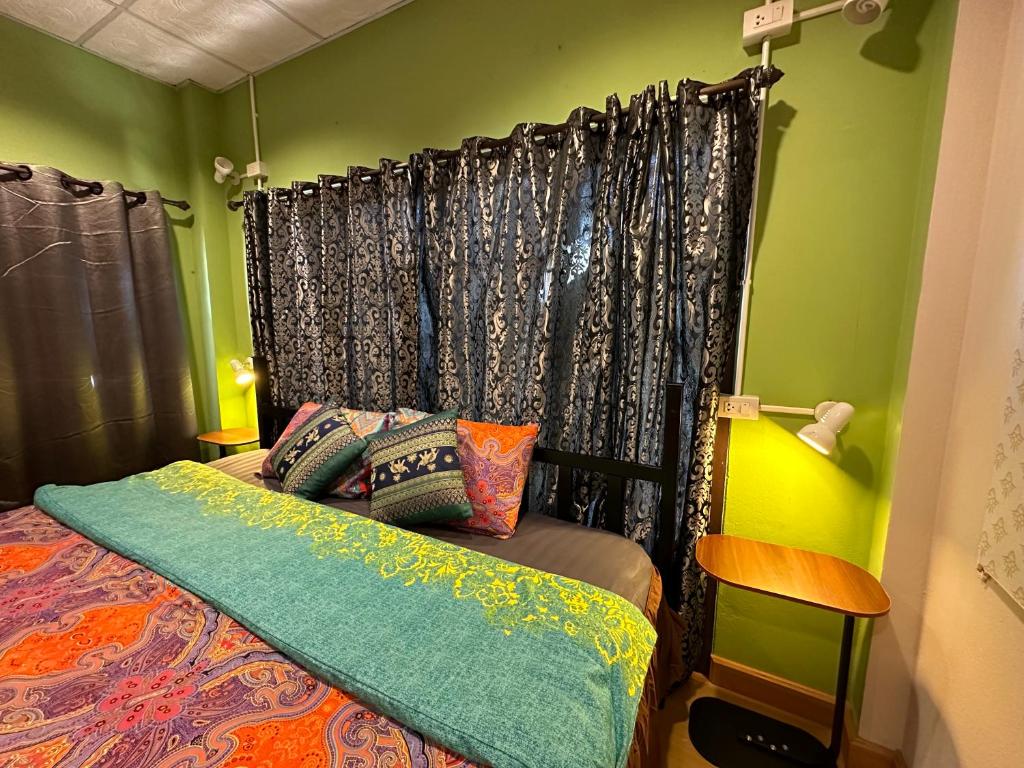 Postel nebo postele na pokoji v ubytování Villa’s Homestay