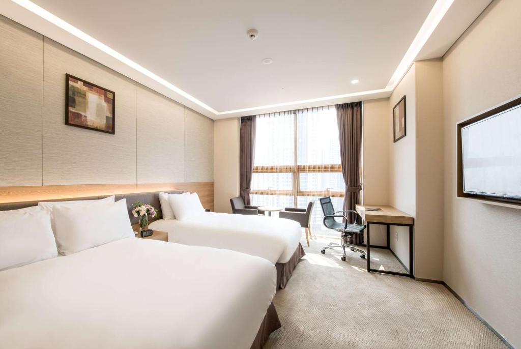 TV a/nebo společenská místnost v ubytování Gloucester Hotel Incheon