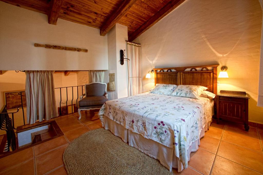 Postel nebo postele na pokoji v ubytování Cortijo De Ramón