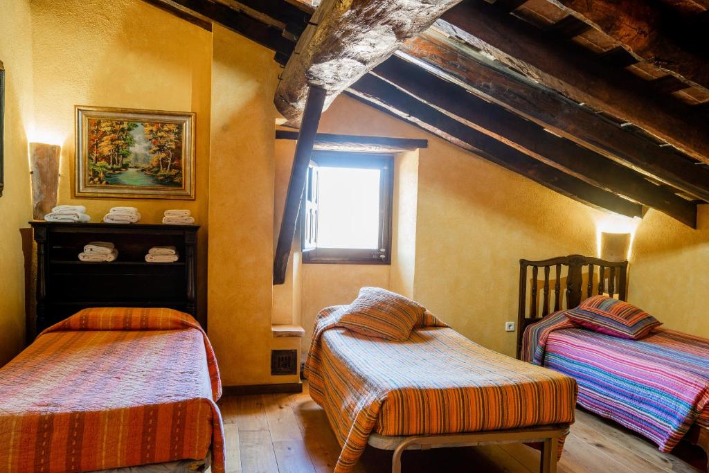 Postel nebo postele na pokoji v ubytování Mas Postius