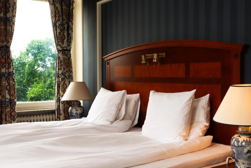Postel nebo postele na pokoji v ubytování Grand Hotel Saltsjöbaden