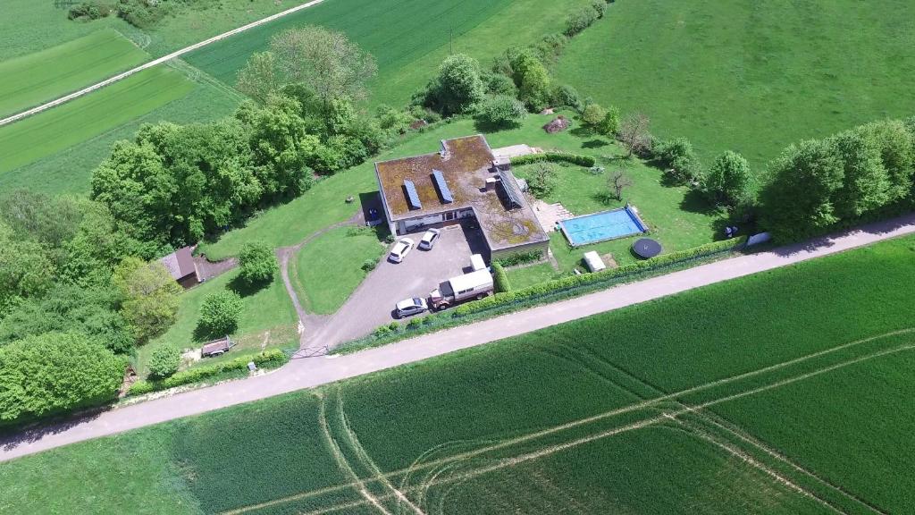 an overhead view of a large house in a field at Nature Paradies am Seeberg in Heidenheim an der Brenz