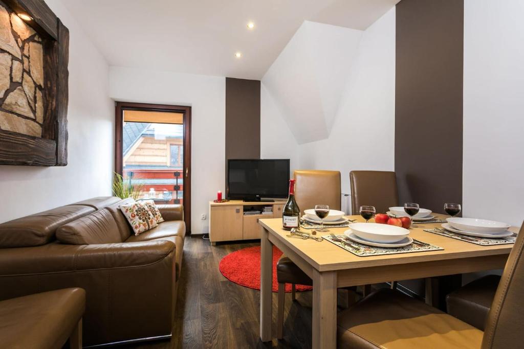 Posedenie v ubytovaní Apartament w malowniczej Dolinie Kościeliskiej by Rent like home
