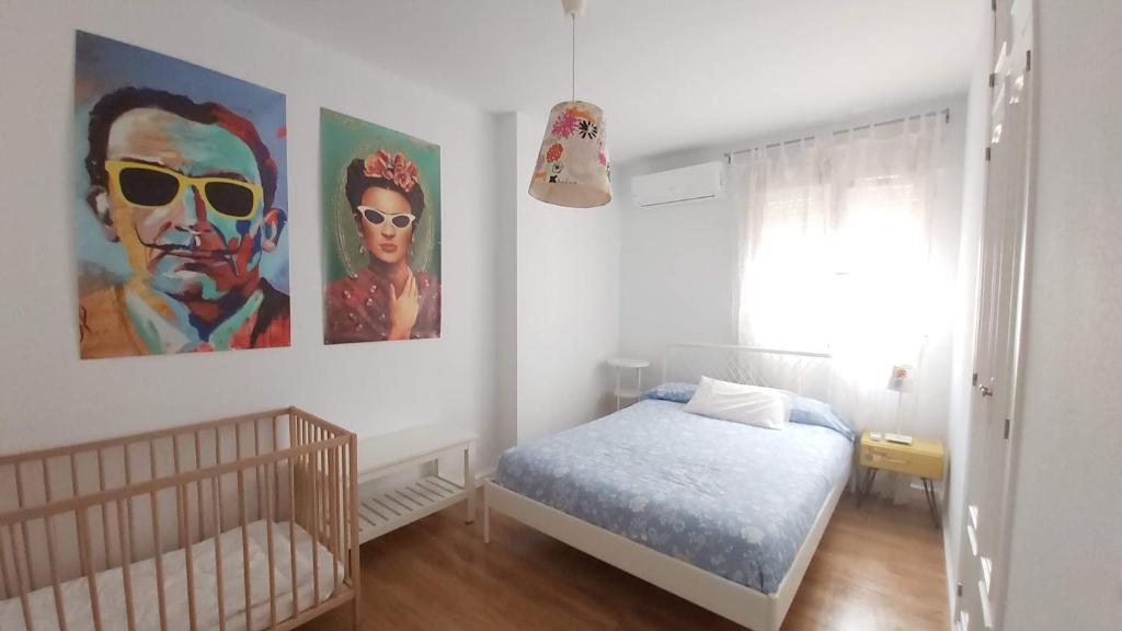 A bed or beds in a room at Casa De Los Espejos