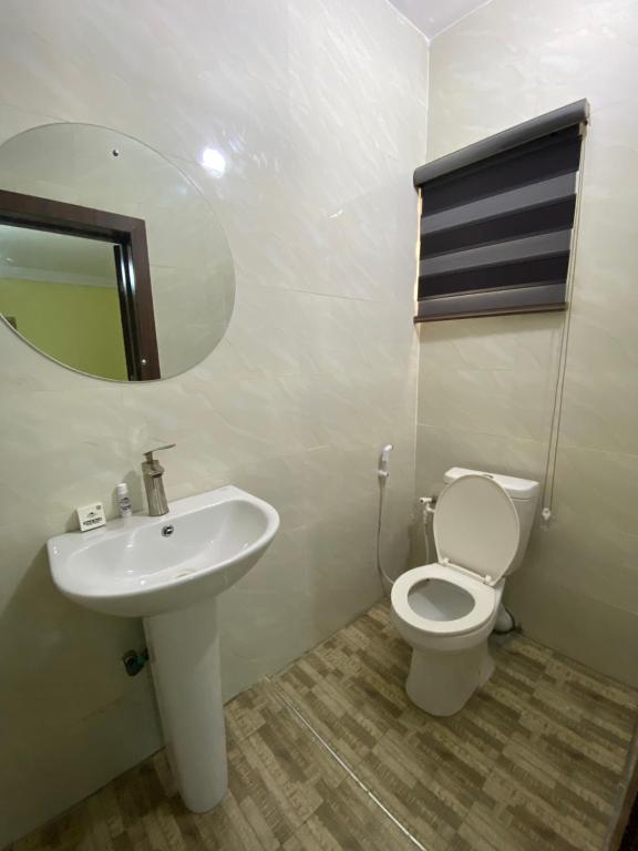 Koupelna v ubytování MOK Apartments & Suites