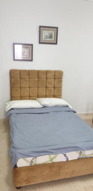 Postel nebo postele na pokoji v ubytování HOUSE IN AL AIN