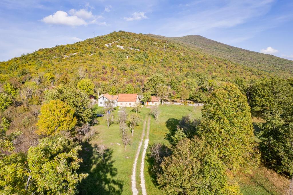 an aerial view of a house on a hill at SOKOL - Secret forest house in Gračac