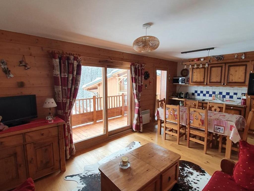 Μια τηλεόραση ή/και κέντρο ψυχαγωγίας στο Appartement cosy 6 pers, piscine, parking, proche pistes - Crest-Voland - FR-1-733-122