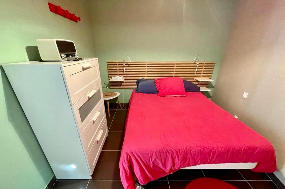Postel nebo postele na pokoji v ubytování Le Studio de Vasconia
