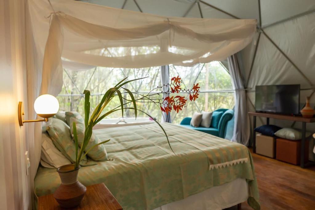 Cama ou camas em um quarto em Pousada do Capão Chapada Diamantina