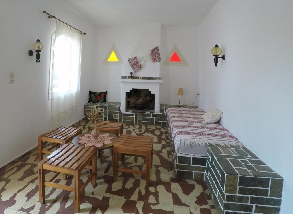 Postel nebo postele na pokoji v ubytování Milos Apartments
