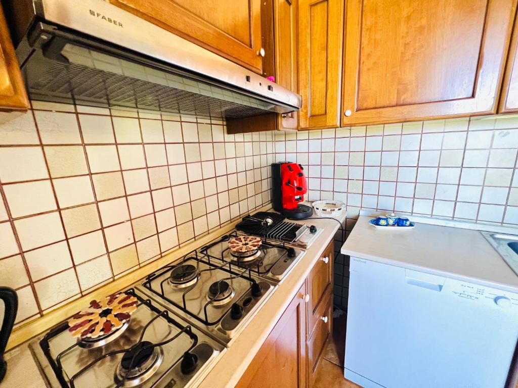 Kuchyň nebo kuchyňský kout v ubytování Villa Giada