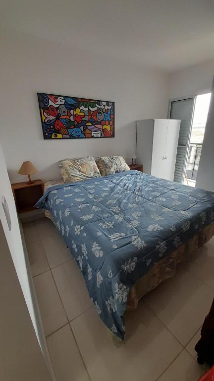 En eller flere senge i et værelse på Casa Nova Tatuapé