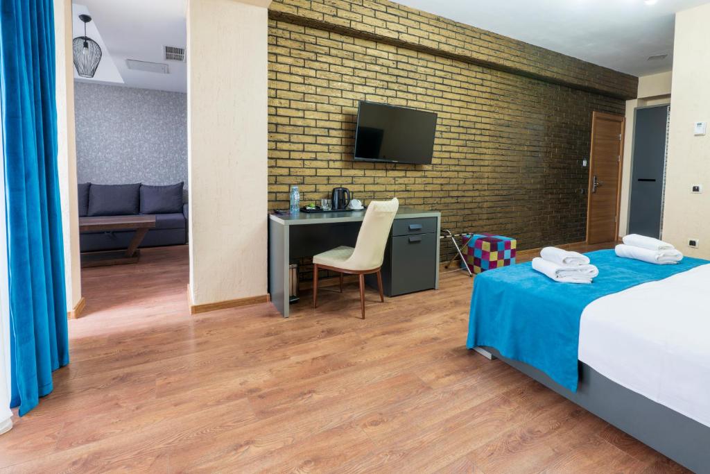 Postel nebo postele na pokoji v ubytování Jazz Hotel