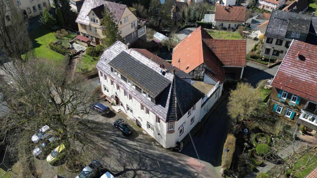 an overhead view of a large building with a roof at Monteurunterkunft Zum Mohr in Birstein