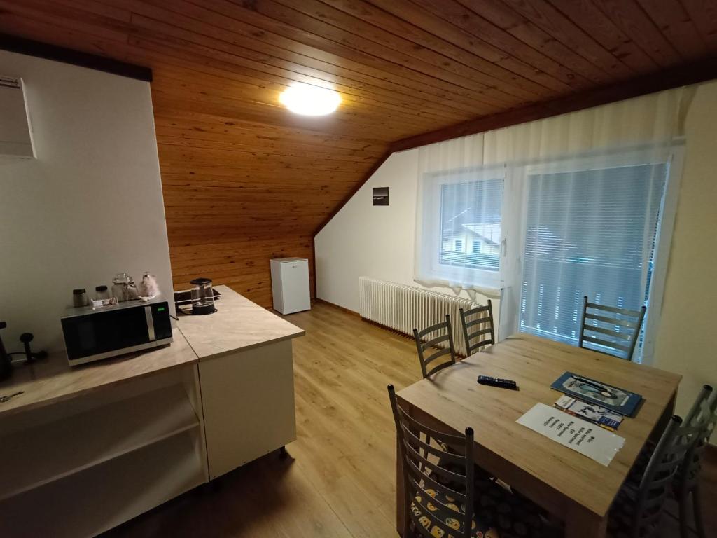Kuchyň nebo kuchyňský kout v ubytování Müller Apartment