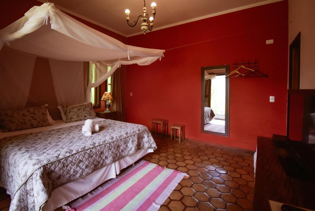Cama ou camas em um quarto em Pousada do Capão Chapada Diamantina