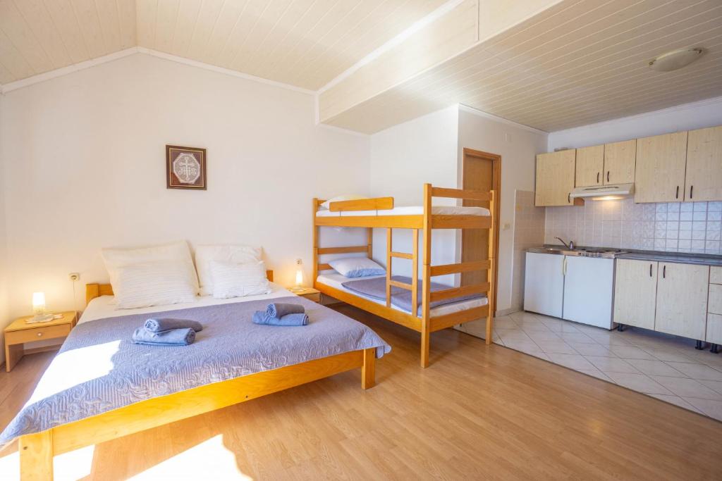Postel nebo postele na pokoji v ubytování Veli Zal