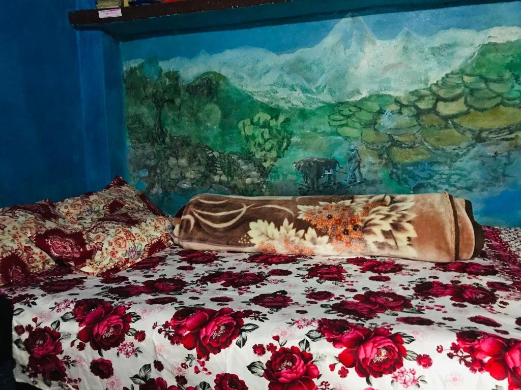 Voodi või voodid majutusasutuse Hom's Homestay & Farmstay Sarangkot Pokhara toas