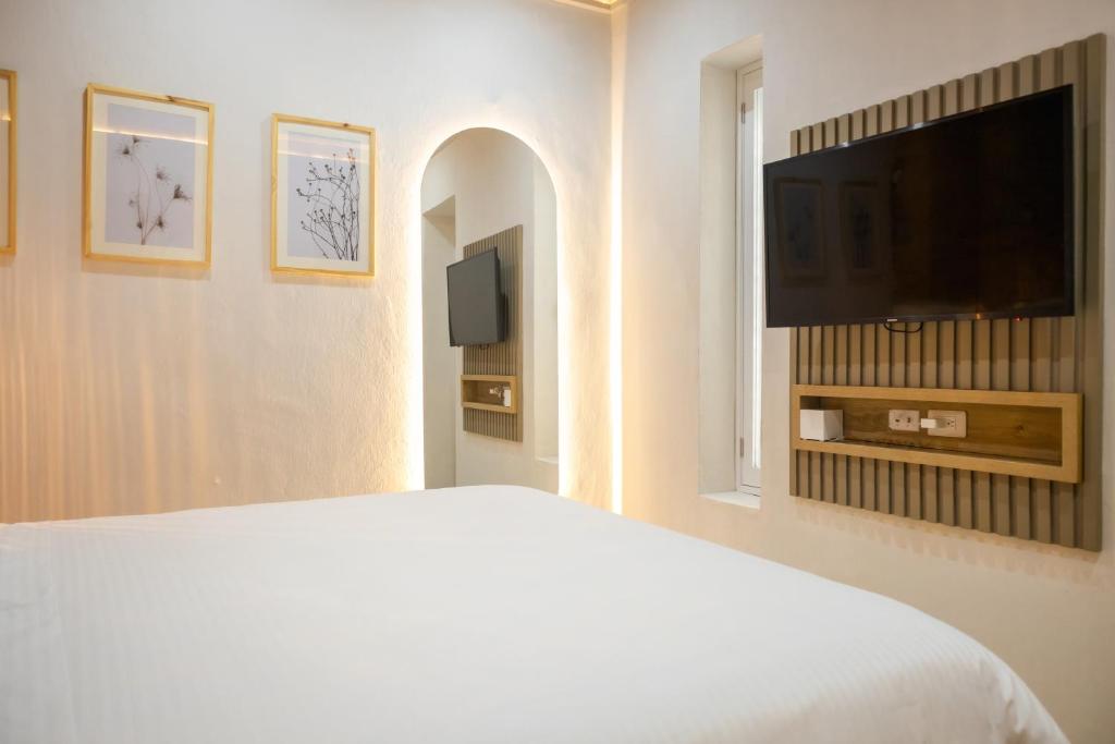 Postel nebo postele na pokoji v ubytování Hotel Casa La Mantilla by Faranda Boutique