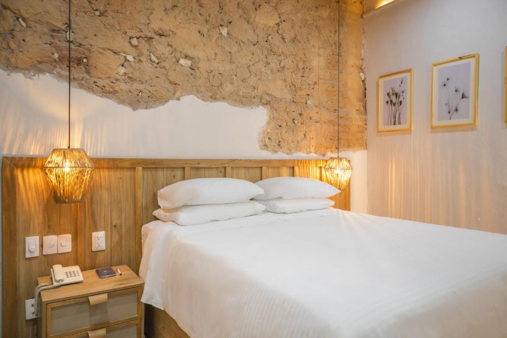 Postel nebo postele na pokoji v ubytování Hotel Casa La Mantilla by Faranda Boutique