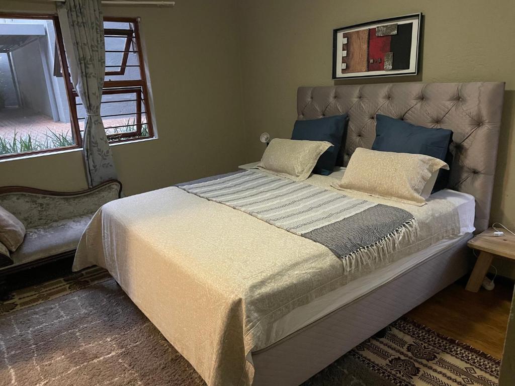 מיטה או מיטות בחדר ב-Comfort zone apartment