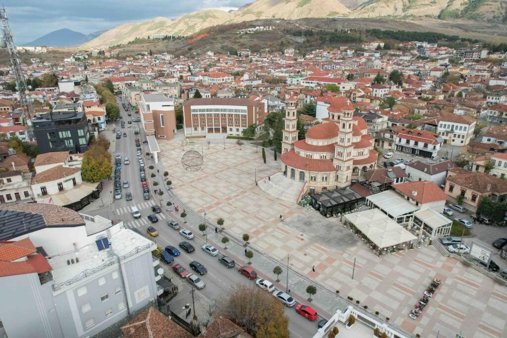 an aerial view of a city with buildings and cars at Lovely Loft City Center Korca #8 in Korçë