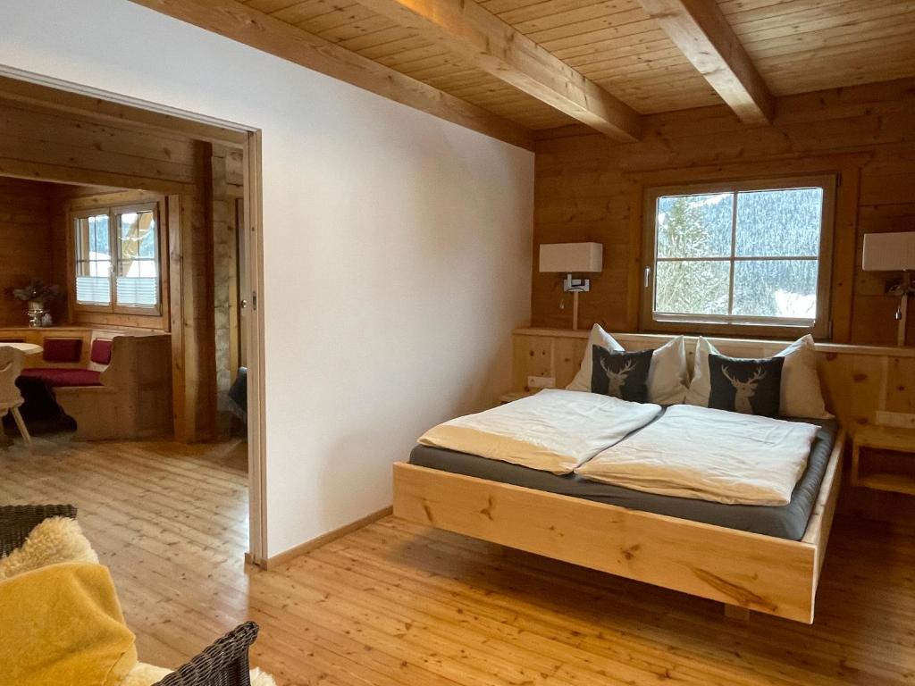 Posteľ alebo postele v izbe v ubytovaní Chalet Kleinbergsonne