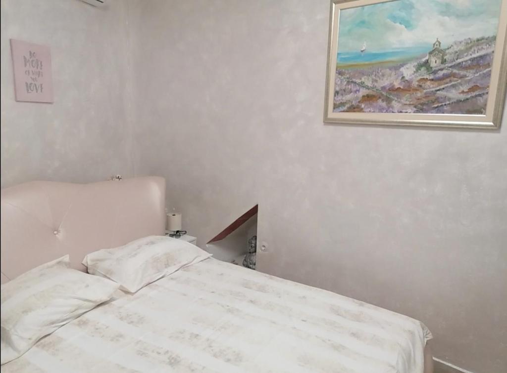 Llit o llits en una habitació de Mihaela Split centre