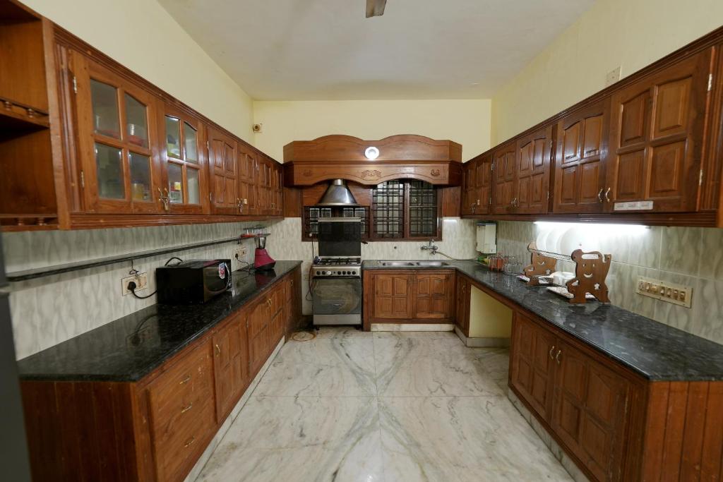 Kuchyň nebo kuchyňský kout v ubytování Metropolitan Serviced Villa
