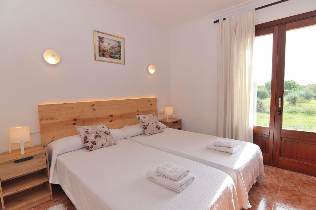 Postel nebo postele na pokoji v ubytování 126 Finca Son Tresco ETV4382 by Mallorca Charme