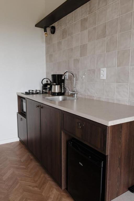 Kuchyň nebo kuchyňský kout v ubytování Cabanas Vinsanto