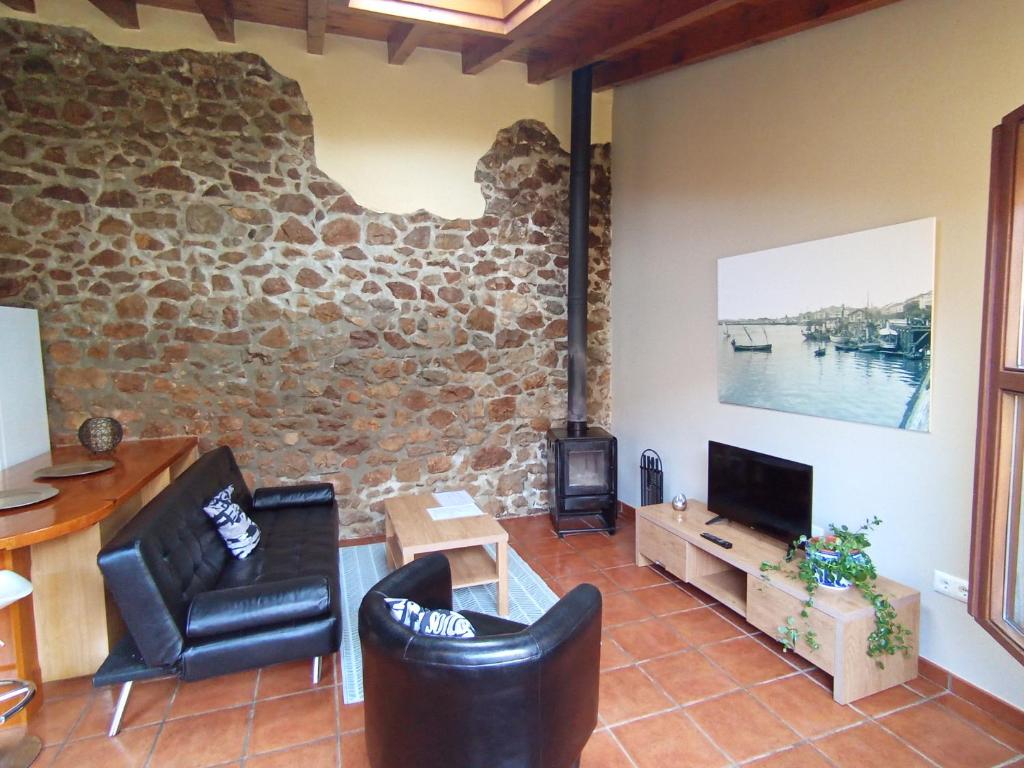 Zona de estar de Apartamentos Las Cuadras de Estaños