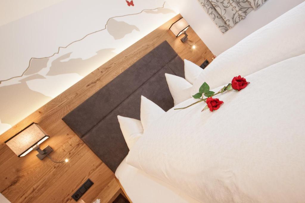 Postel nebo postele na pokoji v ubytování Apartments Schöne Aussicht