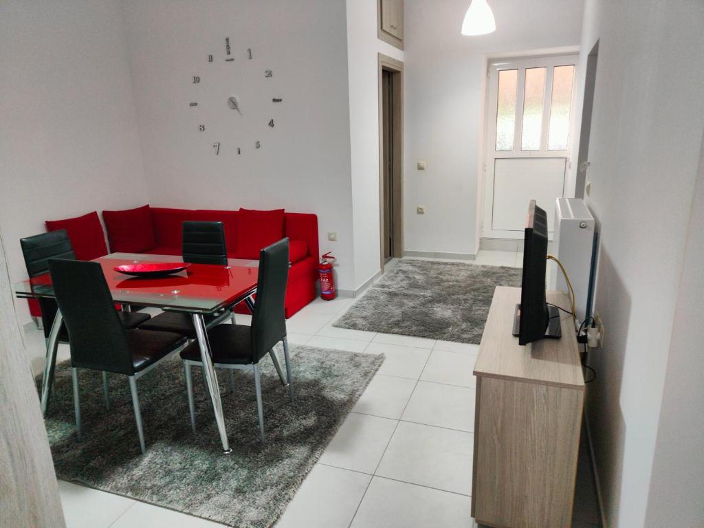 Televízia a/alebo spoločenská miestnosť v ubytovaní Maria's house