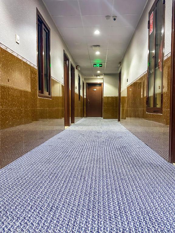 Postel nebo postele na pokoji v ubytování TAMARIND HOTEL