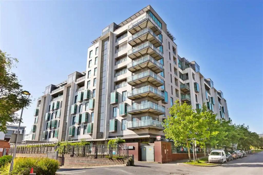 a large apartment building on a city street at Two bed apartment in Sandyford in Dublin