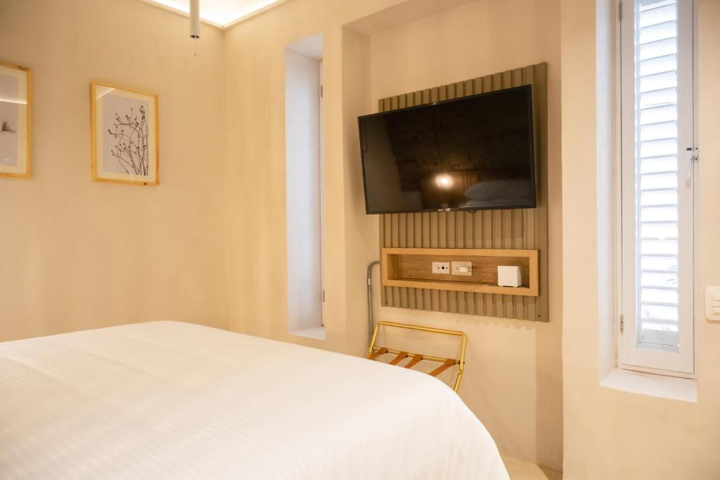 Postel nebo postele na pokoji v ubytování Hotel Casa La Mantilla by Faranda Boutique