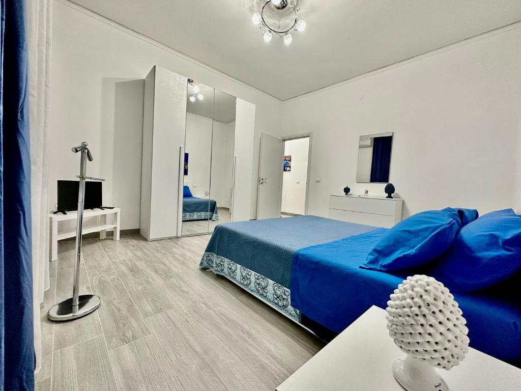 Postel nebo postele na pokoji v ubytování OUR BEAUTIFUL SICILY